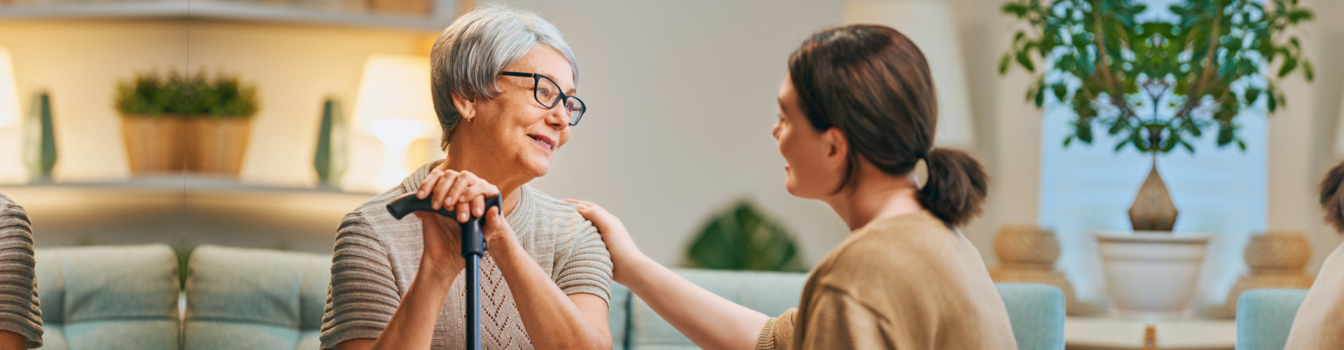 caregiver holding senior woman